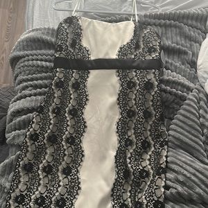 Mini dress never worn.  Size 12.  Strapless.